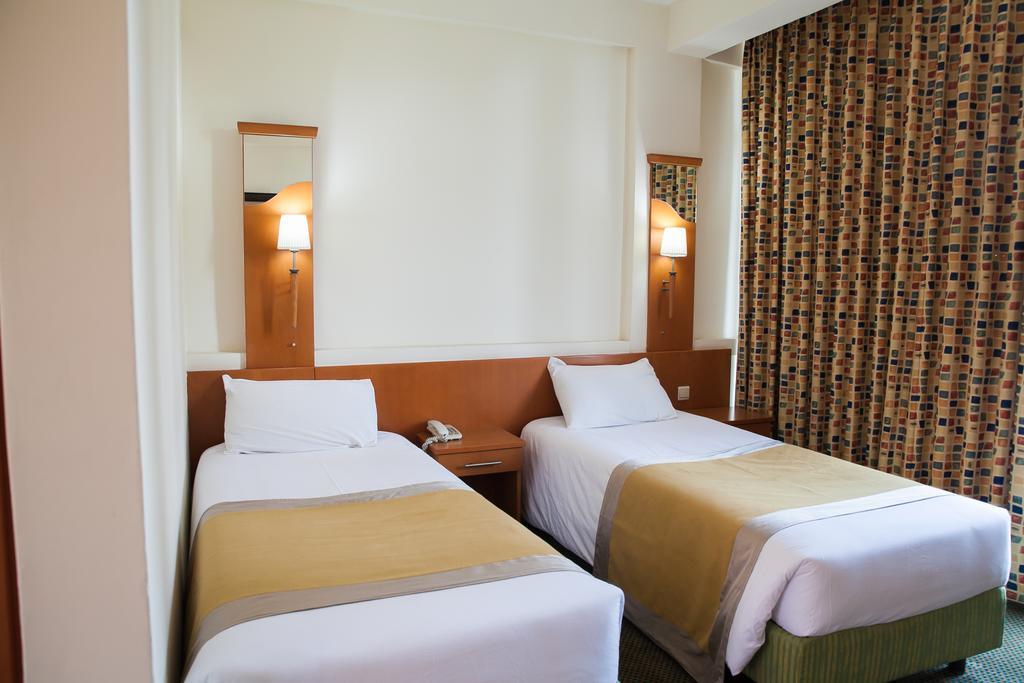 Gorillas City Centre Hotel Кігалі Номер фото